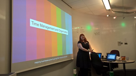 Anna Bravington giving a presentation